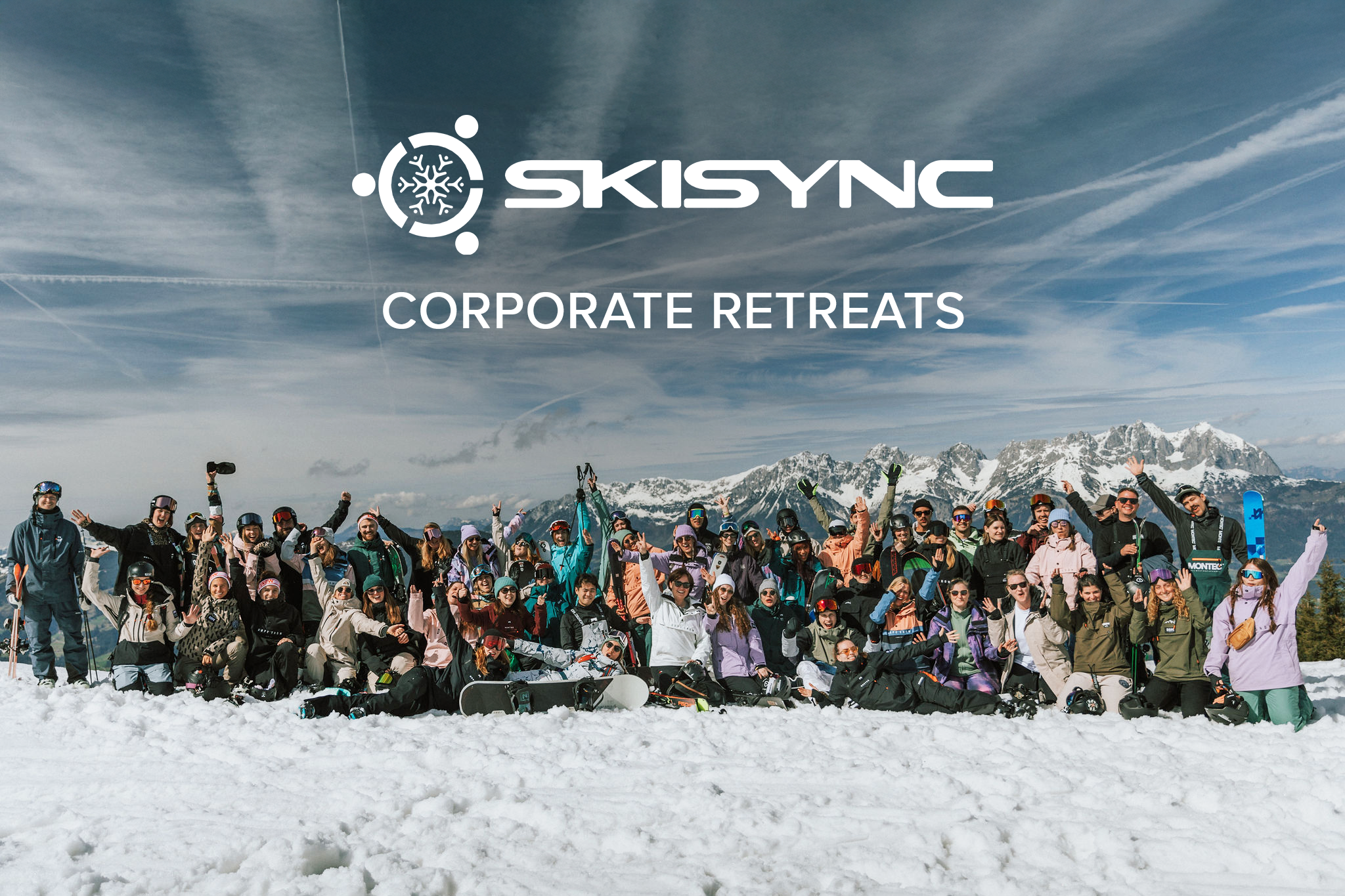 company on a corporate ski trip with skisync - large group of skier and snowboards on the mountain